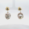 Video of Polka Dot Baroque Pearl Drop Earrings Gold Emerald, showing the drop, movement and scale from multiple angles.