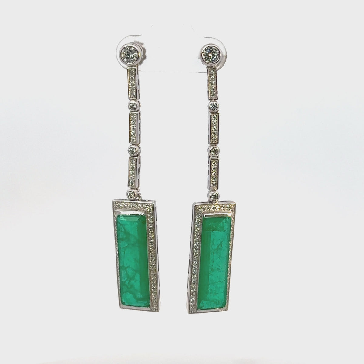 Rotating display the earrings.