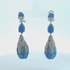 Video of Carmen Blue Opal Drop Earrings Silver, showing the drop, movement and scale from multiple angles.