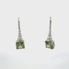 Video of Spiral Square Crystal Drop Earrings Peridot Green Silver, showing the drop, movement and scale from multiple angles.