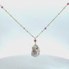Video of Polka Dot Baroque Pearl Long Necklace Gold Ruby, showing the pendant, chain and scale from multiple angles.