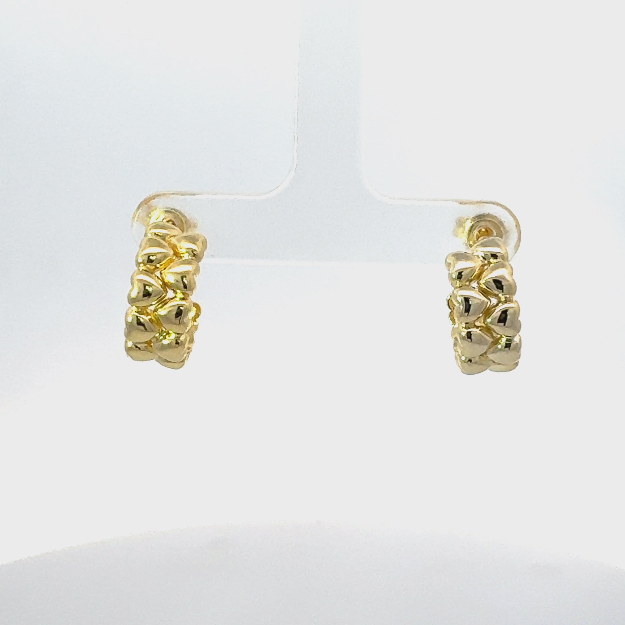 Video of Heartfelt Embrace Hoop Earrings Gold, showing the drop, movement and scale from multiple angles.