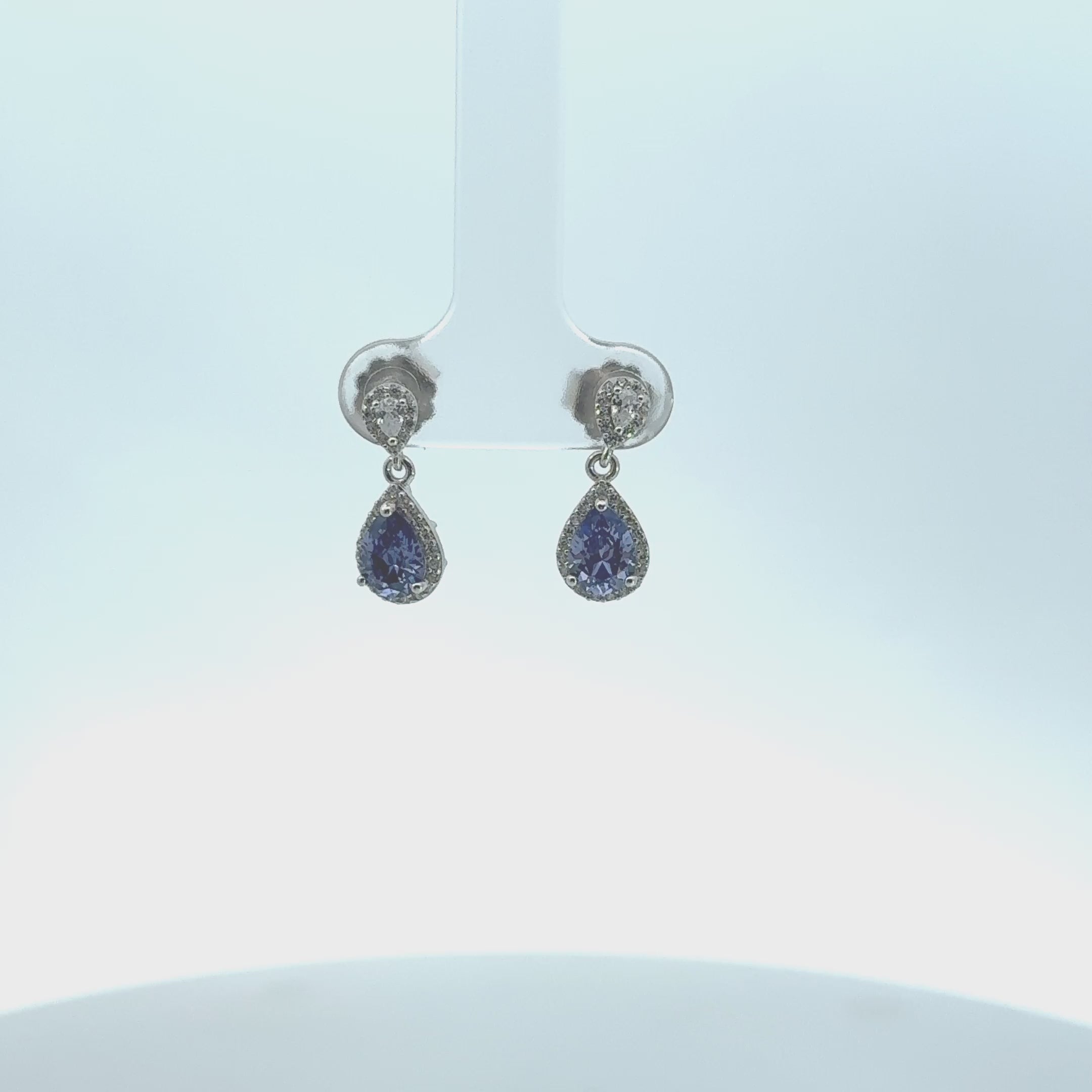 Video of Phillippa Drop Earrings Tanzanite Silver, showing the drop, movement and scale from multiple angles.