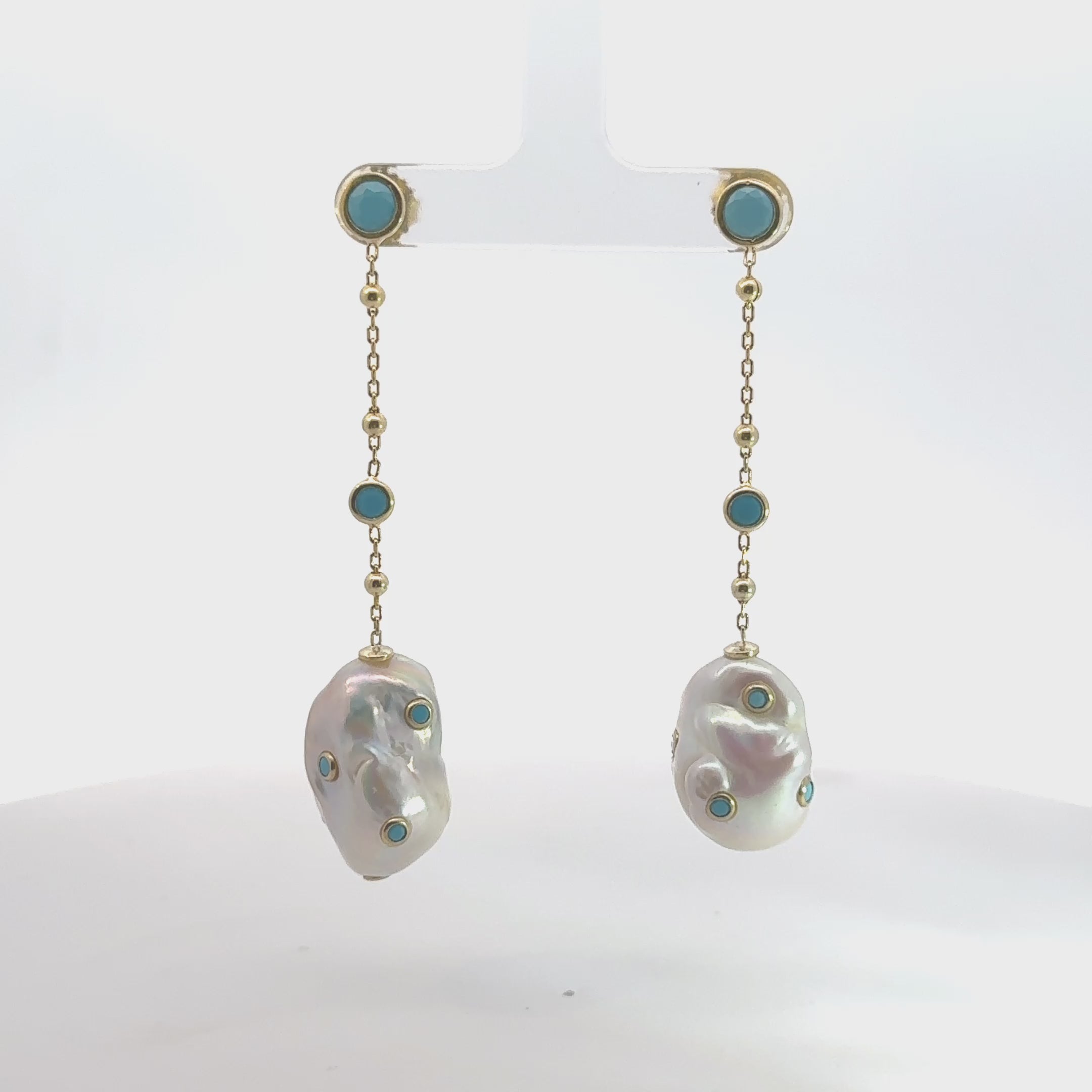 Video of Polka Dot Baroque Pearl Chain Drop Earrings Gold Turquoise, showing the drop, movement and scale from multiple angles.