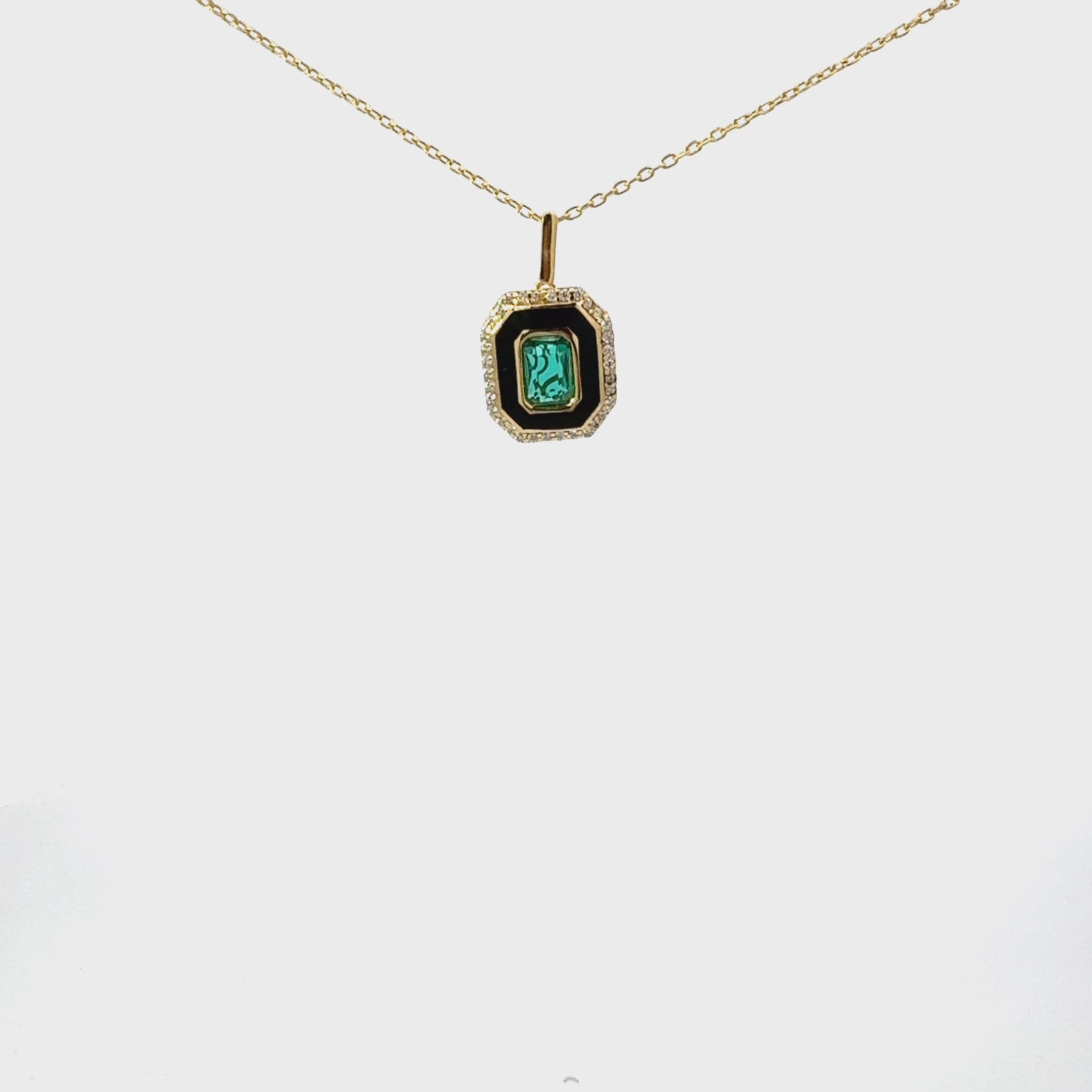Video of Art Deco Emerald And Enamel Pendant Necklace Gold, showing the pendant, chain and scale from multiple angles.