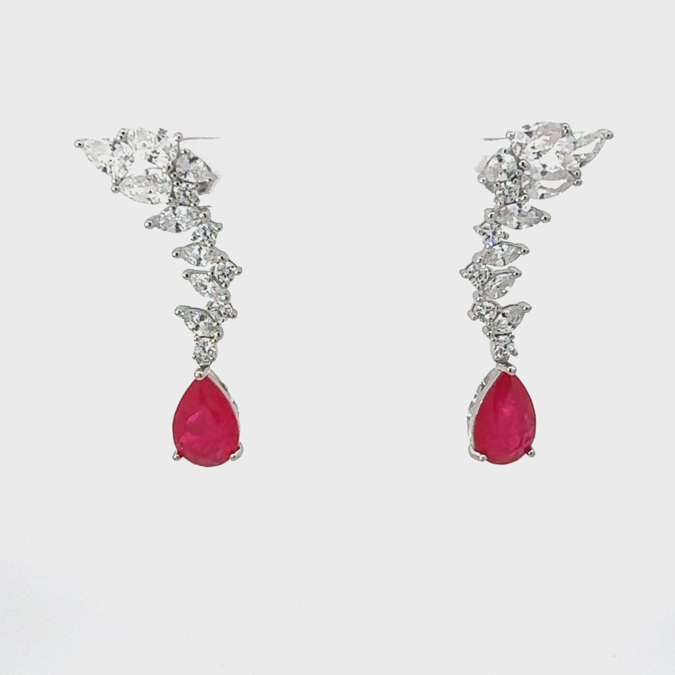 Video of Henriette Teardrop Earrings Pink Tourmaline Silver, showing the drop, movement and scale from multiple angles.