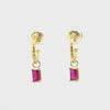 Video of Bamboo Hoop with Ruby Earrings Gold, showing the drop, movement and scale from multiple angles.