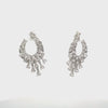 Video of Blazing Flames Hoop Earrings Silver, showing the drop, movement and scale from multiple angles.