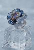 Video of Blue Rose Flower Cocktail Ring Silver, showing the setting, profile and finish from multiple angles.