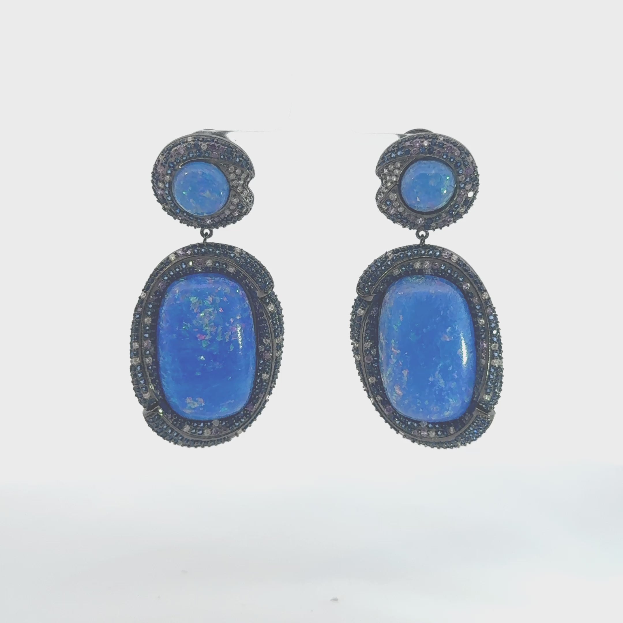 Video of Fiorella Blue Opal Drop Earrings Silver Oxidised, showing the drop, movement and scale from multiple angles.