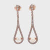 Video of Cradled Pearl Drop Earrings Rose Gold, showing the drop, movement and scale from multiple angles.