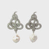 Video of Viper Snake Baroque Pearl Drop Earrings Silver White CZ, showing the drop, movement and scale from multiple angles.