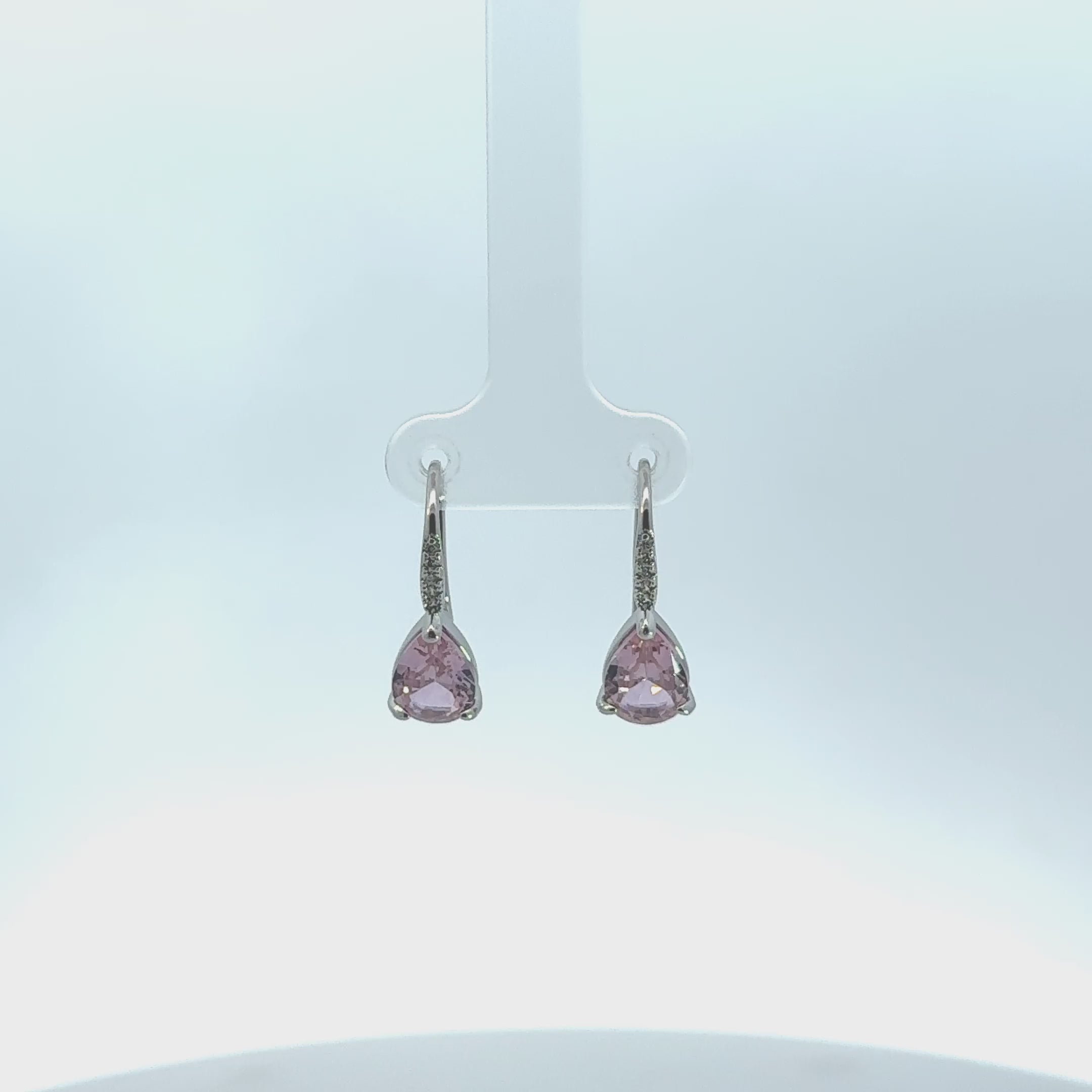 Video of Julie Teardrop Earrings Morganite Pink, showing the drop, movement and scale from multiple angles.