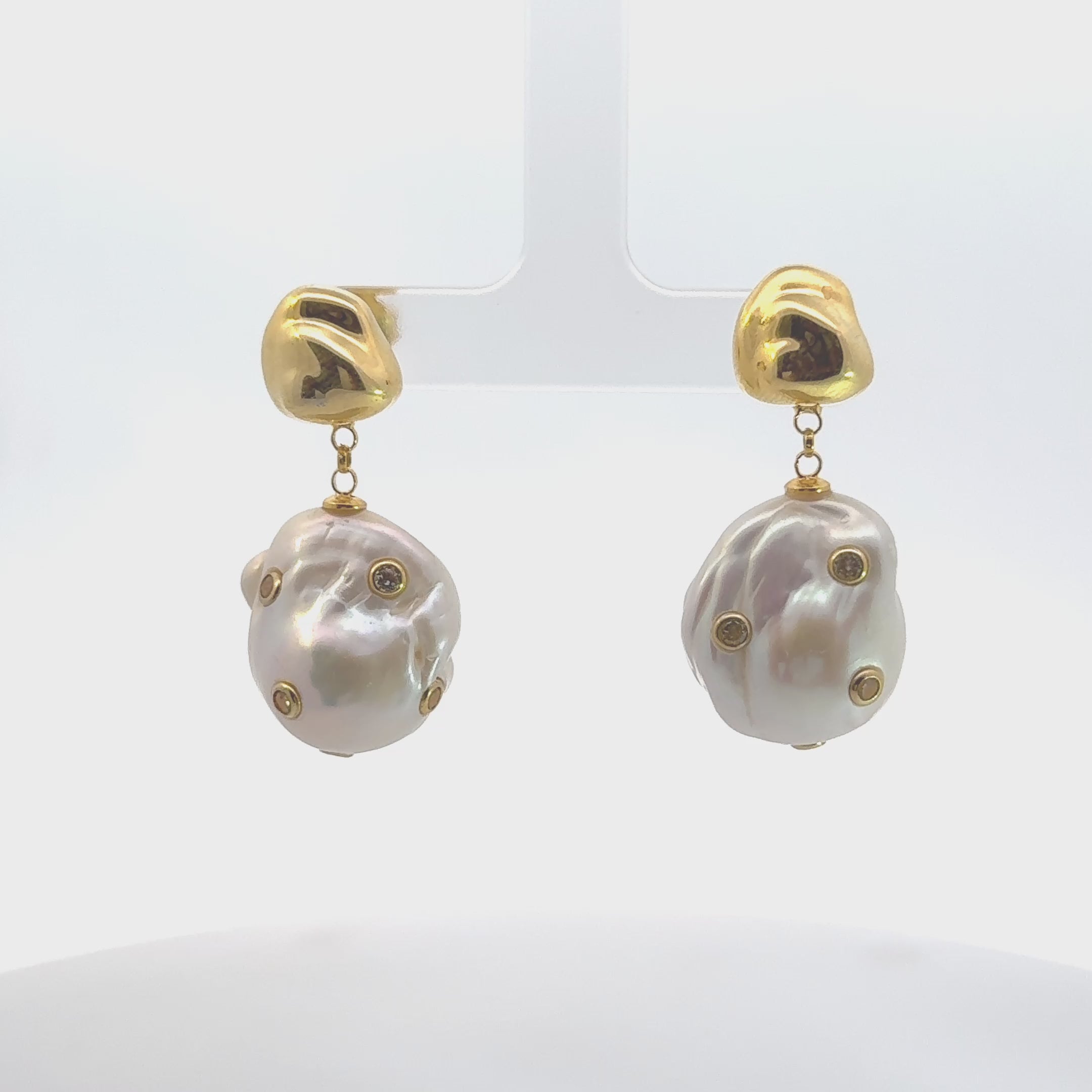 Video of Polka Dot Baroque Pearl Drop Earrings Gold Cz, showing the drop, movement and scale from multiple angles.