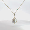 Video of Polka Dot Baroque Pearl Pendant Necklace Gold Emerald, showing the pendant, chain and scale from multiple angles.