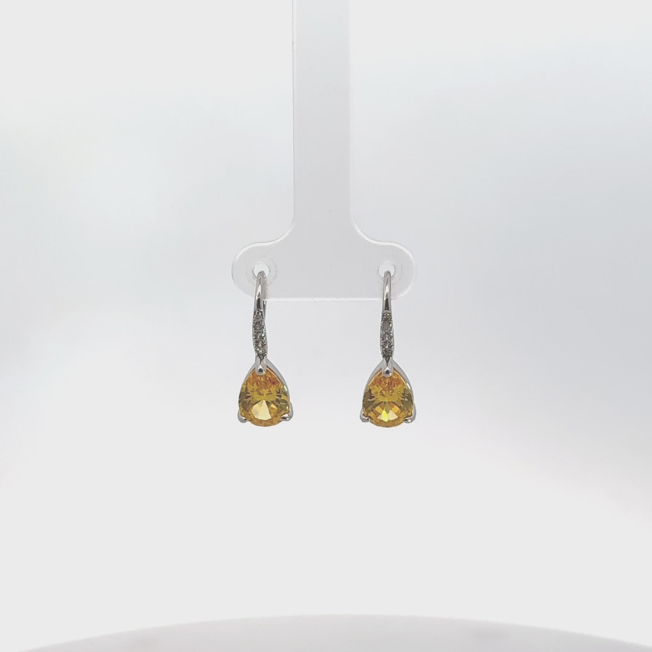 Video of Julie Teardrop Earrings Yellow Topaz, showing the drop, movement and scale from multiple angles.