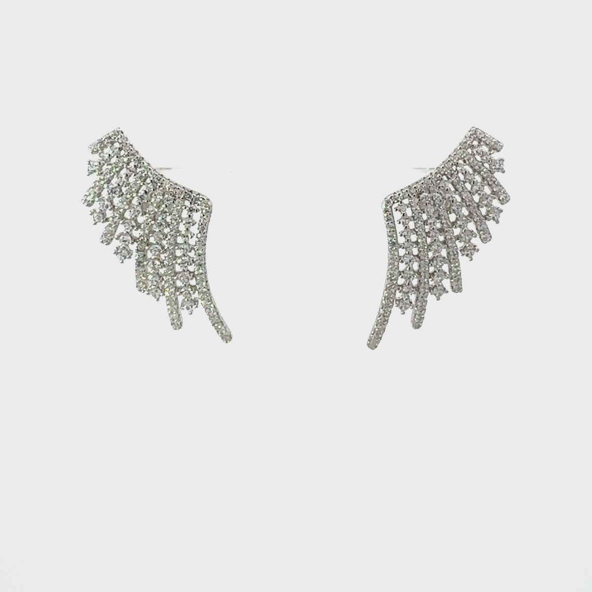 Video of Aniela Angel Wing Ear Climbers Silver, showing the drop, movement and scale from multiple angles.