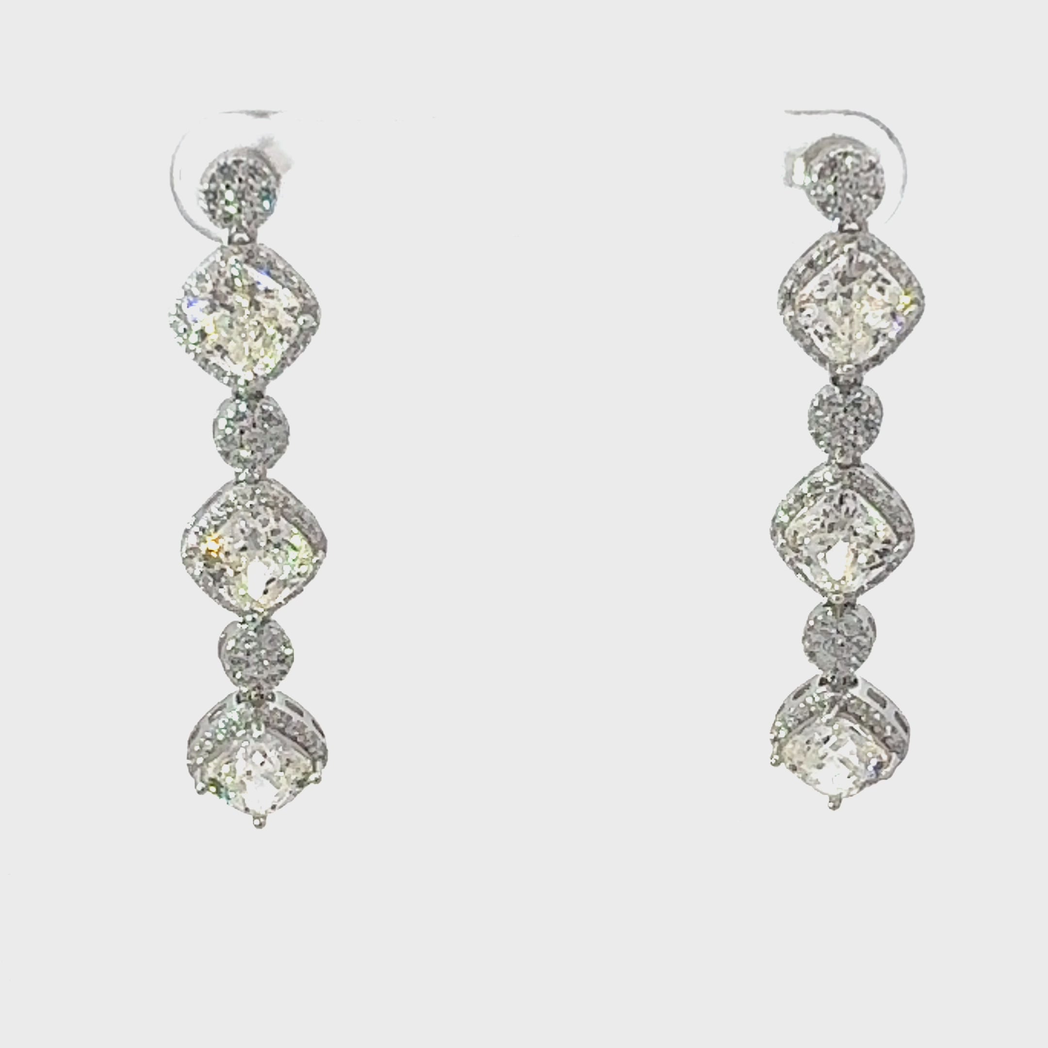 Video of Elena Drop Earrings Moissanite Silver, showing the drop, movement and scale from multiple angles.