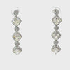 Video of Elena Drop Earrings Moissanite Silver, showing the drop, movement and scale from multiple angles.