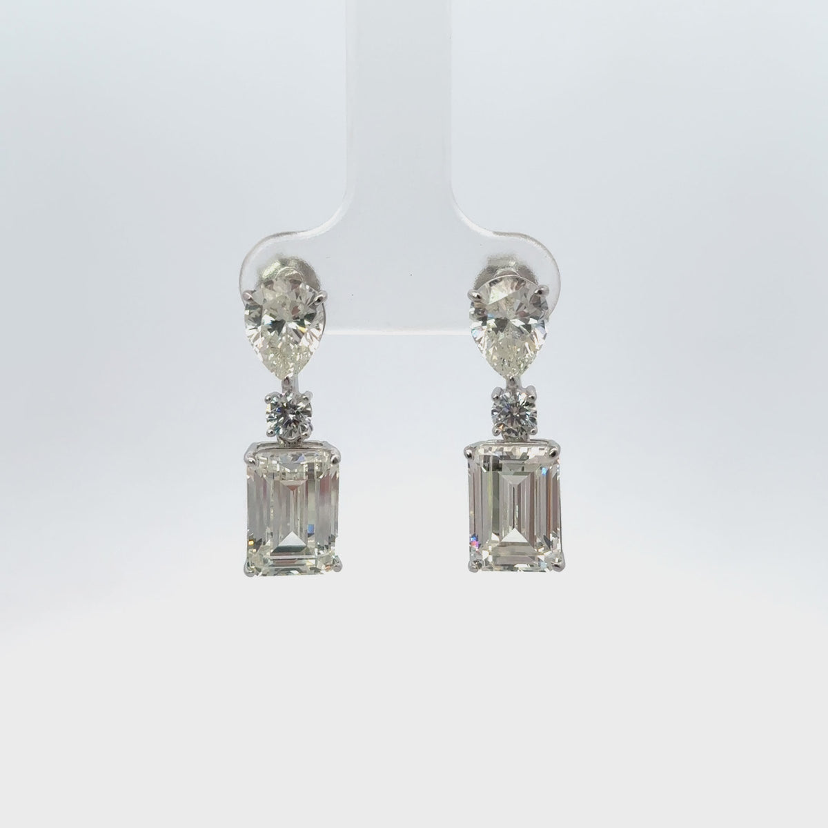 Rotating display the earrings.