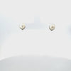 Video of Pearl Angular Stud Earrings Silver, showing the drop, movement and scale from multiple angles.