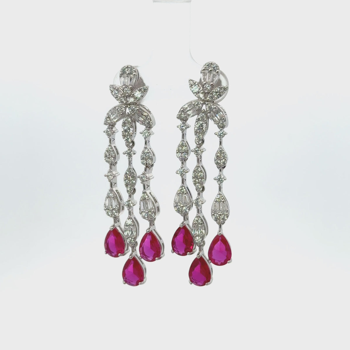 Rotating display the earrings.