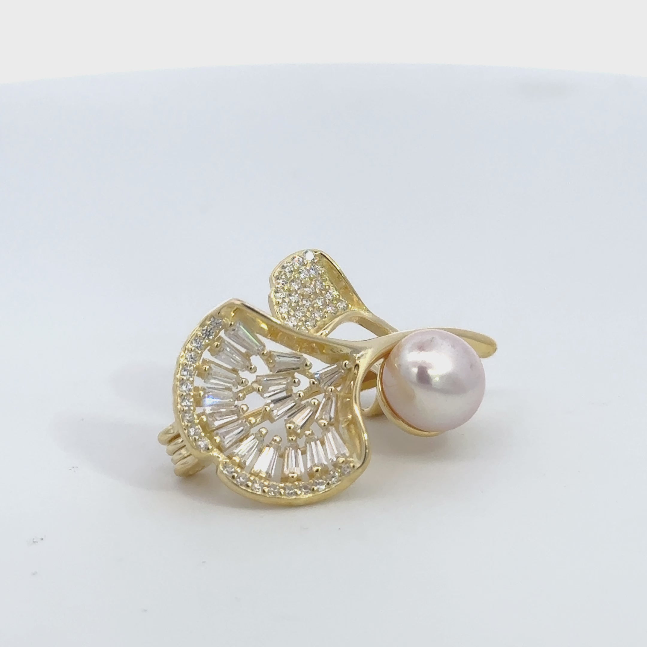 Rotating display the brooch.