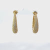 Rotating display of the earrings.