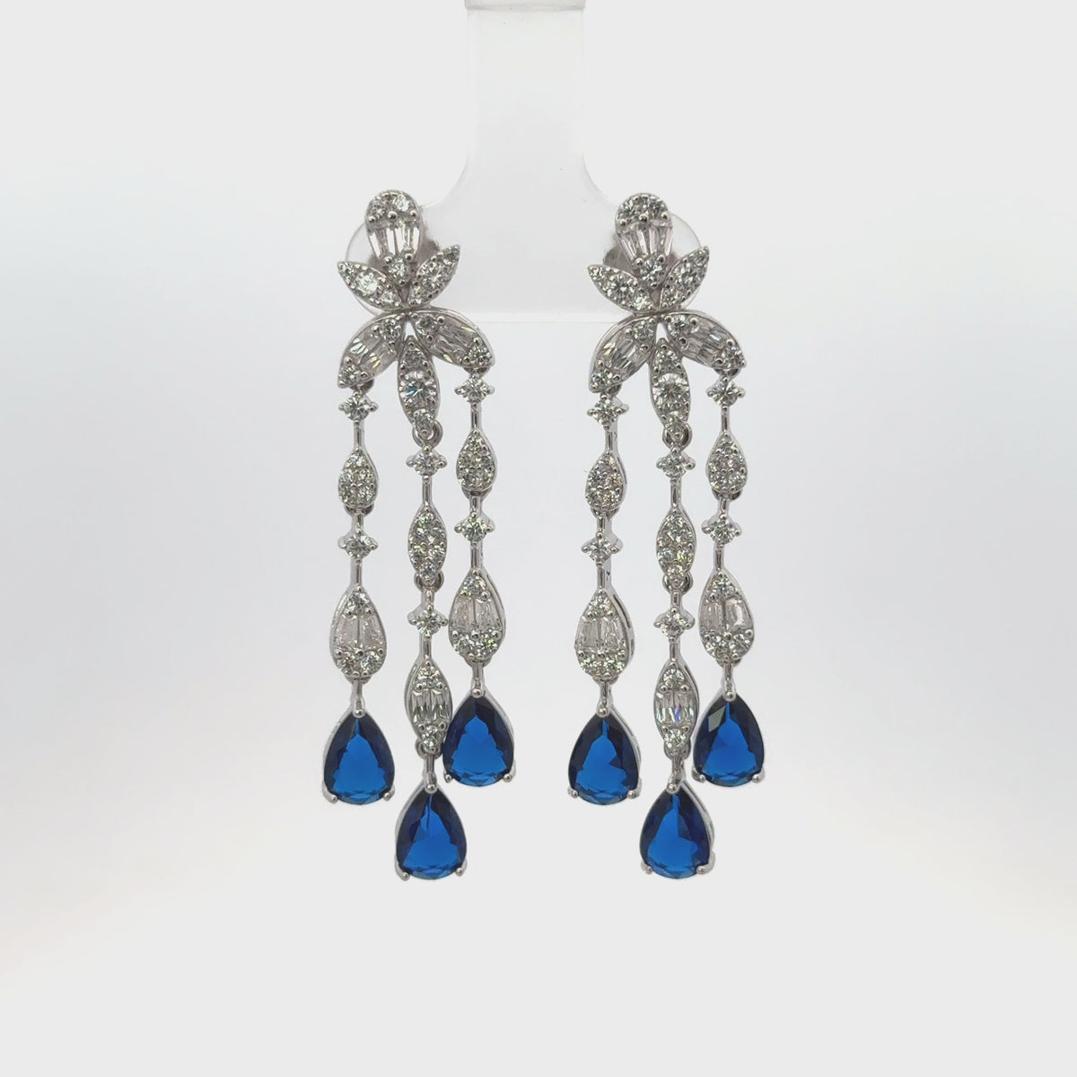 Rotating display the earrings.