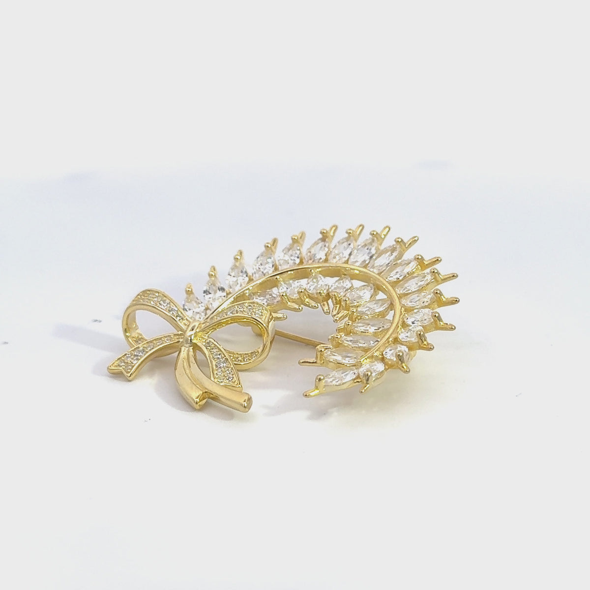 Rotating display the brooch.
