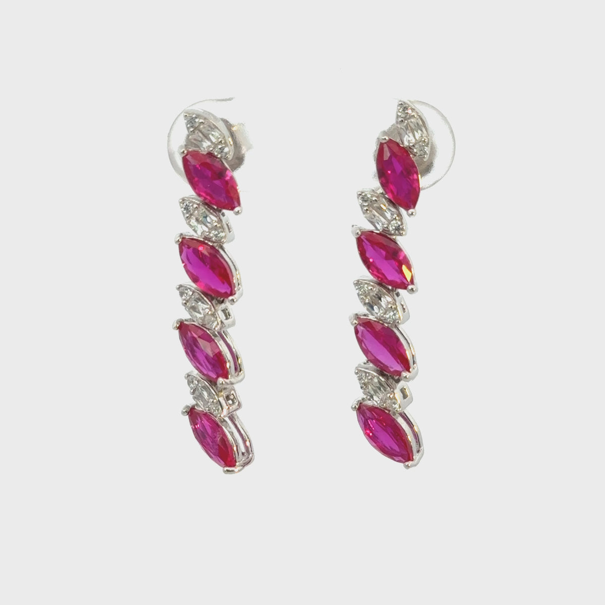 Rotating display the earrings.