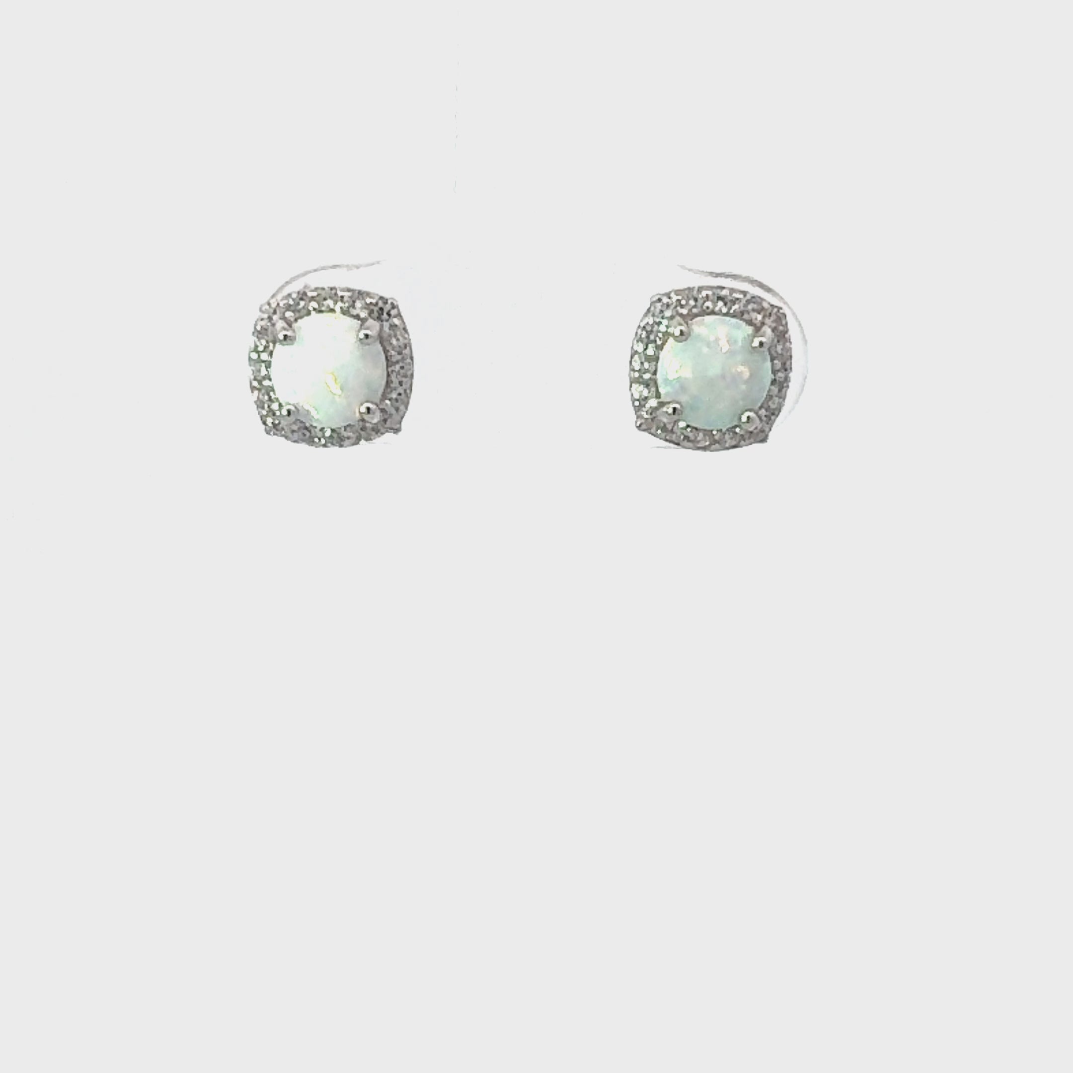Video of Opal And Sparkle Stud Earrings Silver, showing the drop, movement and scale from multiple angles.