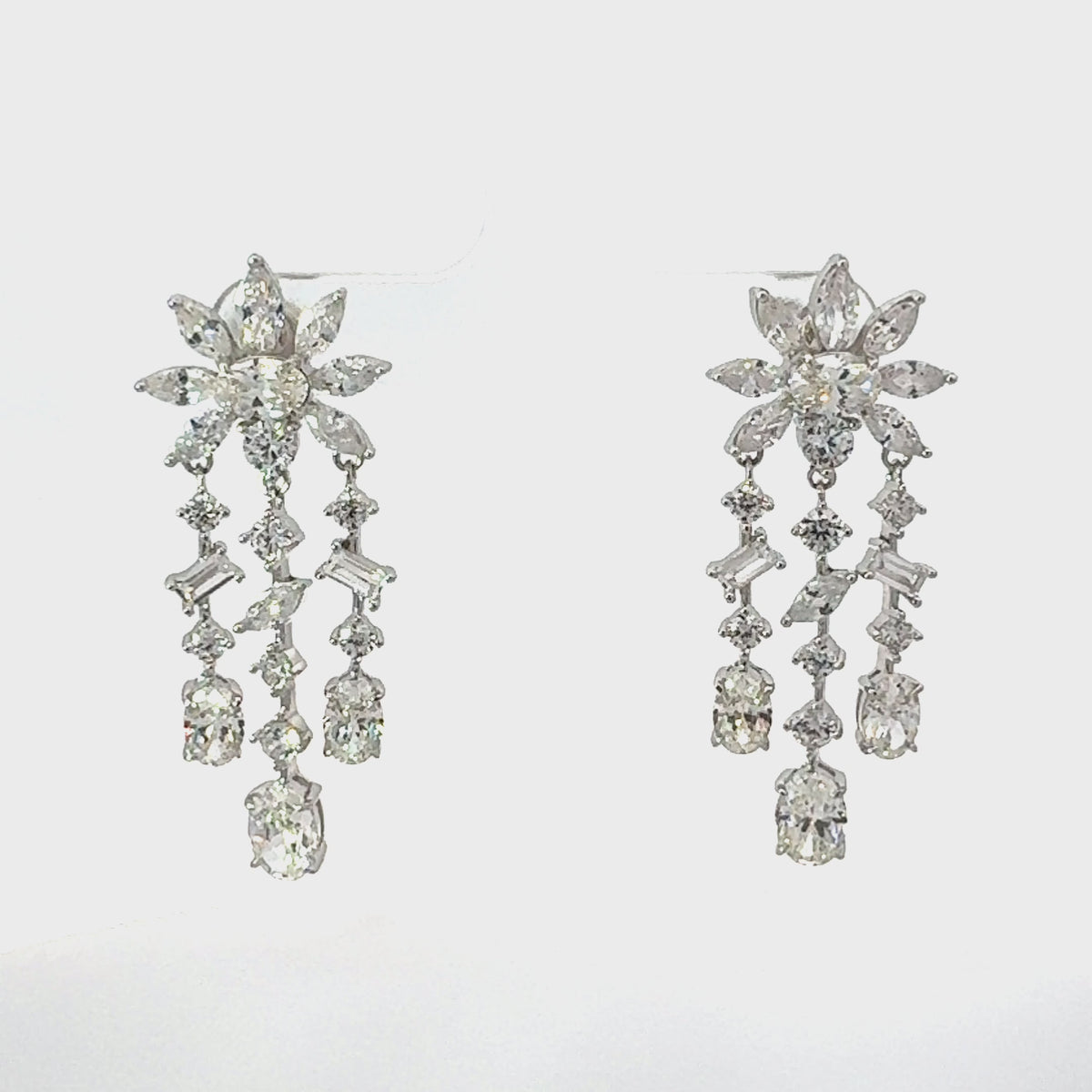 Video of Margarita Daisy Flower Moissanite Chandelier Earrings Silver, showing the drop, movement and scale from multiple angles.
