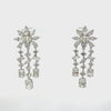 Video of Margarita Daisy Flower Moissanite Chandelier Earrings Silver, showing the drop, movement and scale from multiple angles.