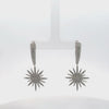 Video of Star Burst Drop Earrings Silver, showing the drop, movement and scale from multiple angles.