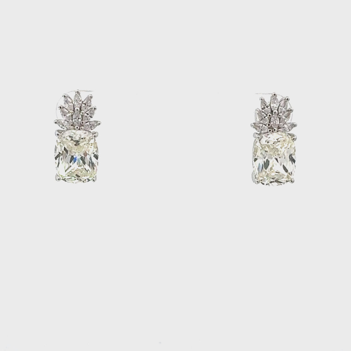 Video of Pineapple Gemstone Earrings Moissanite Silver, showing the drop, movement and scale from multiple angles.