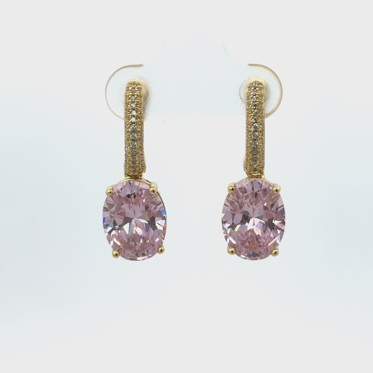 Rotating display the earrings.