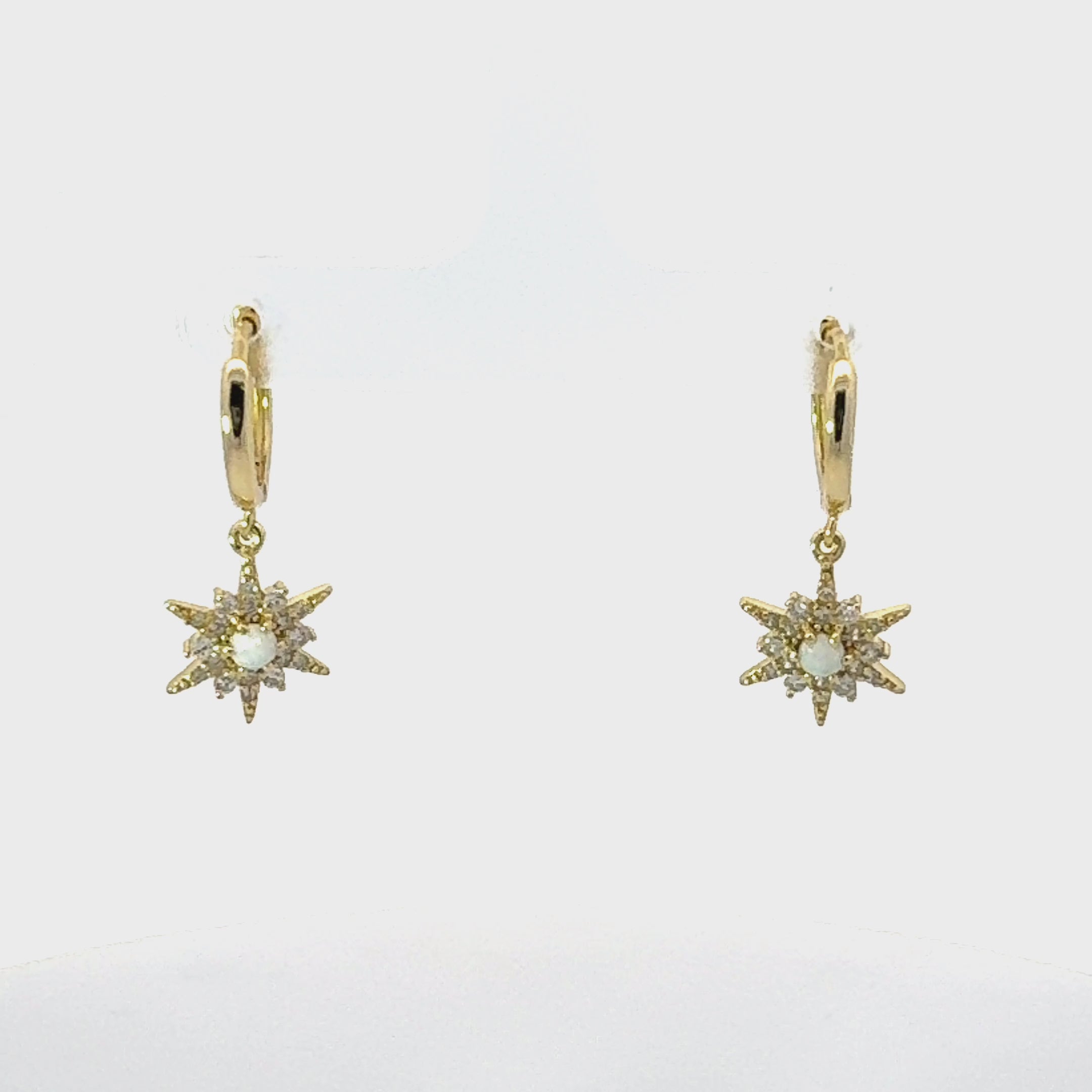 Video of Opal Starburst Hoop Earrings Gold, showing the drop, movement and scale from multiple angles.