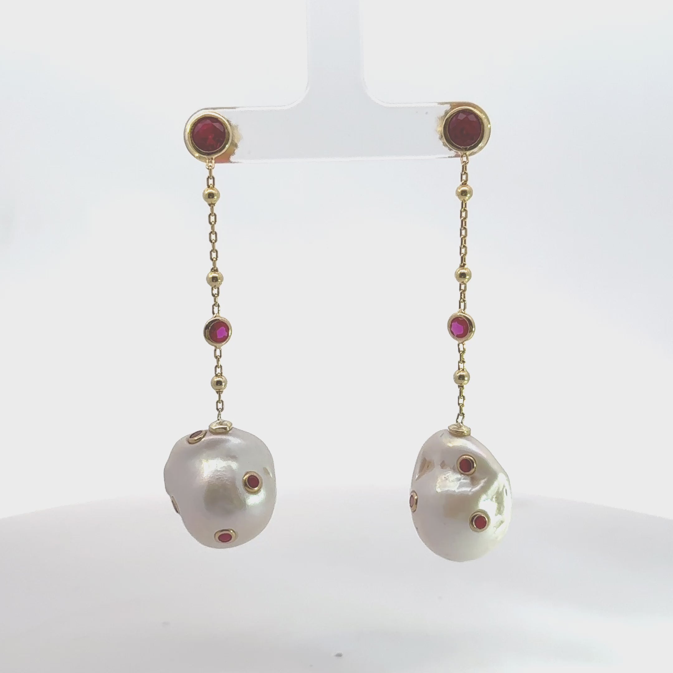 Video of Polka Dot Baroque Pearl Chain Drop Earrings Gold Ruby, showing the drop, movement and scale from multiple angles.