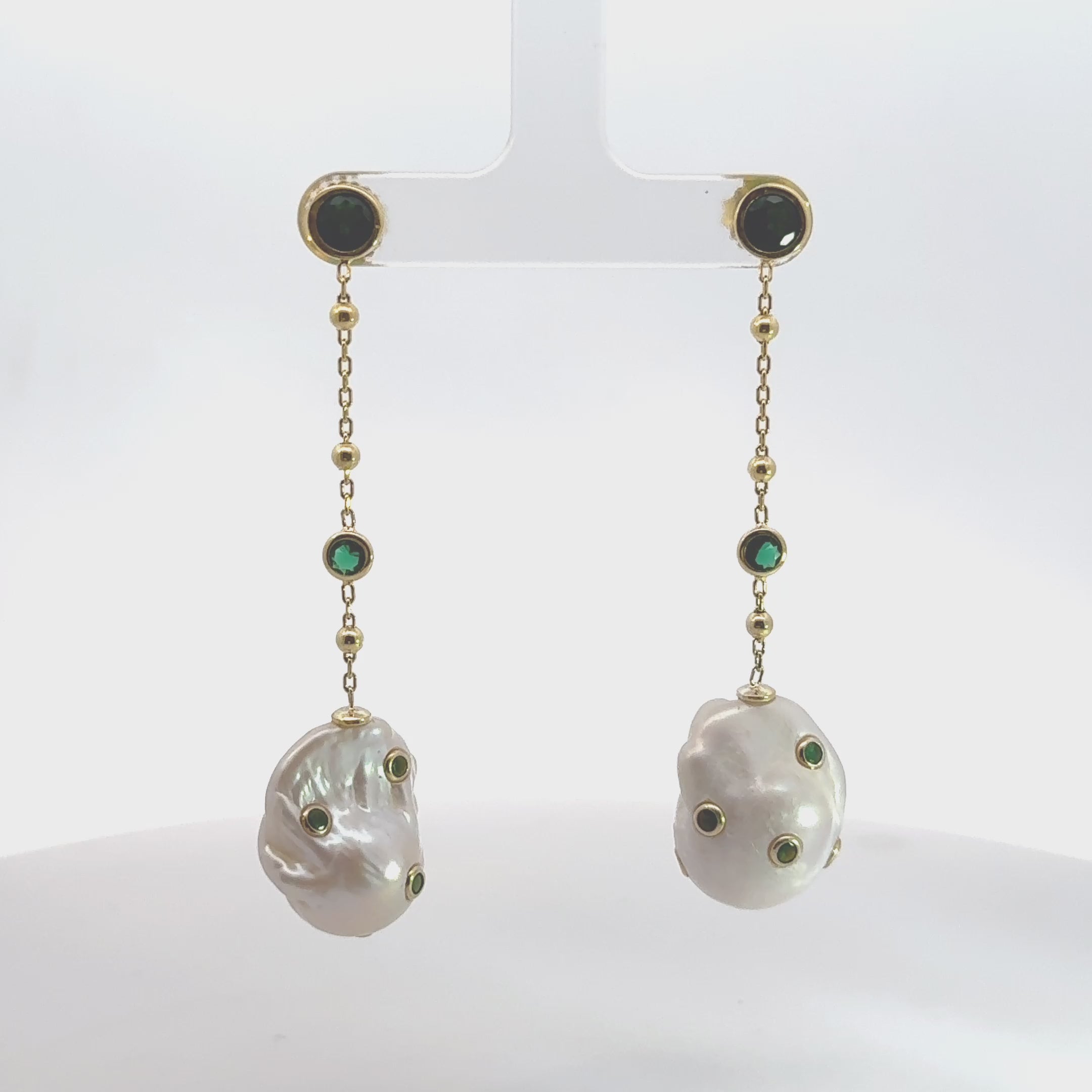 Video of Polka Dot Baroque Pearl Chain Drop Earrings Gold Emerald, showing the drop, movement and scale from multiple angles.