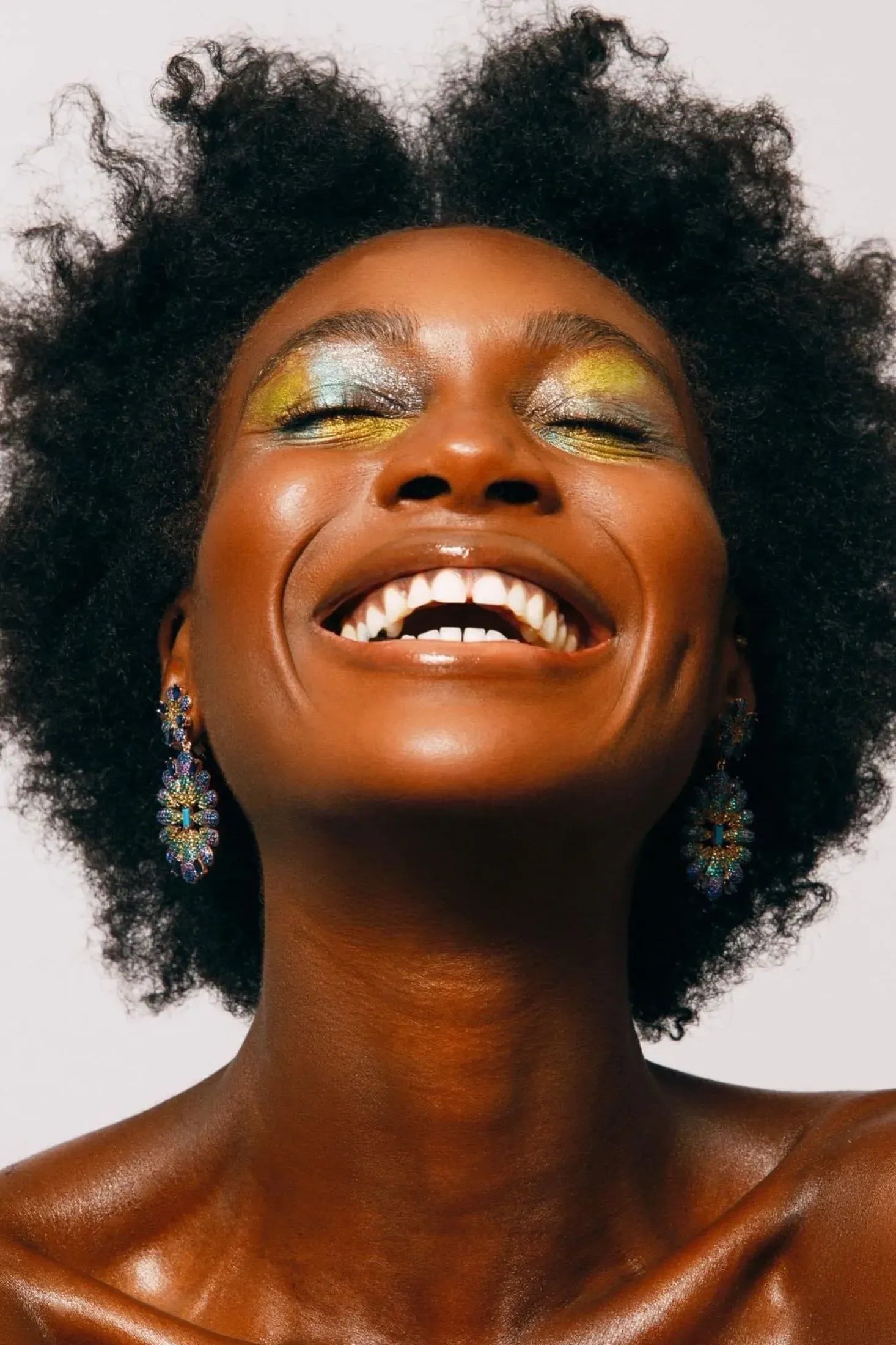 The earring worn by a model.