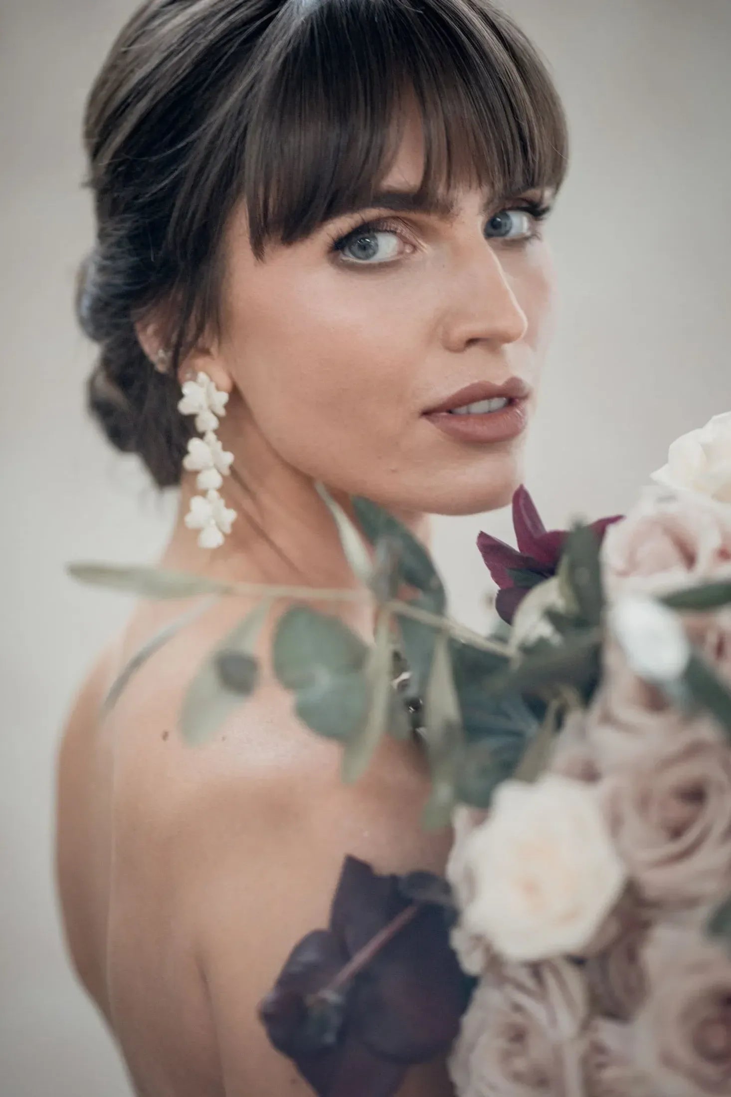 The earring worn by a bride.