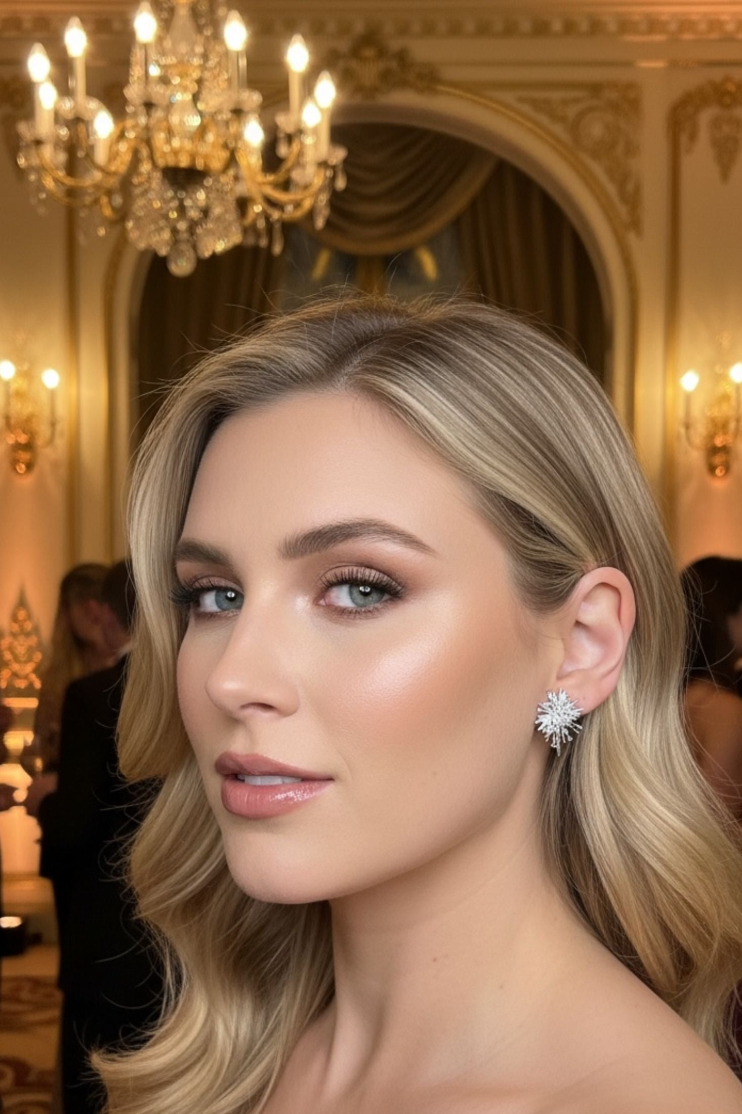 The earring worn by a model.