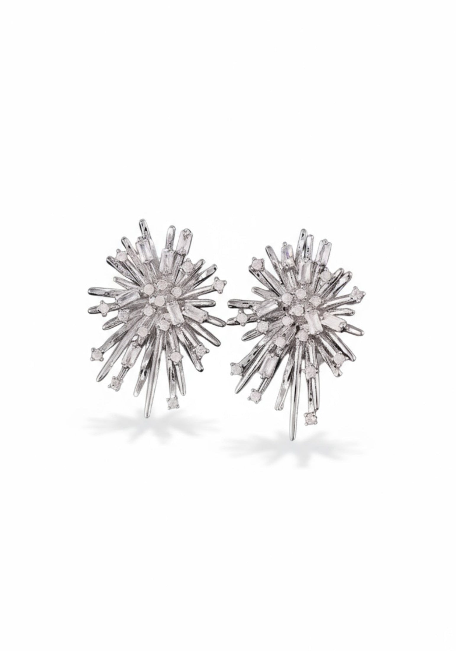 Silver starburst stud earrings.