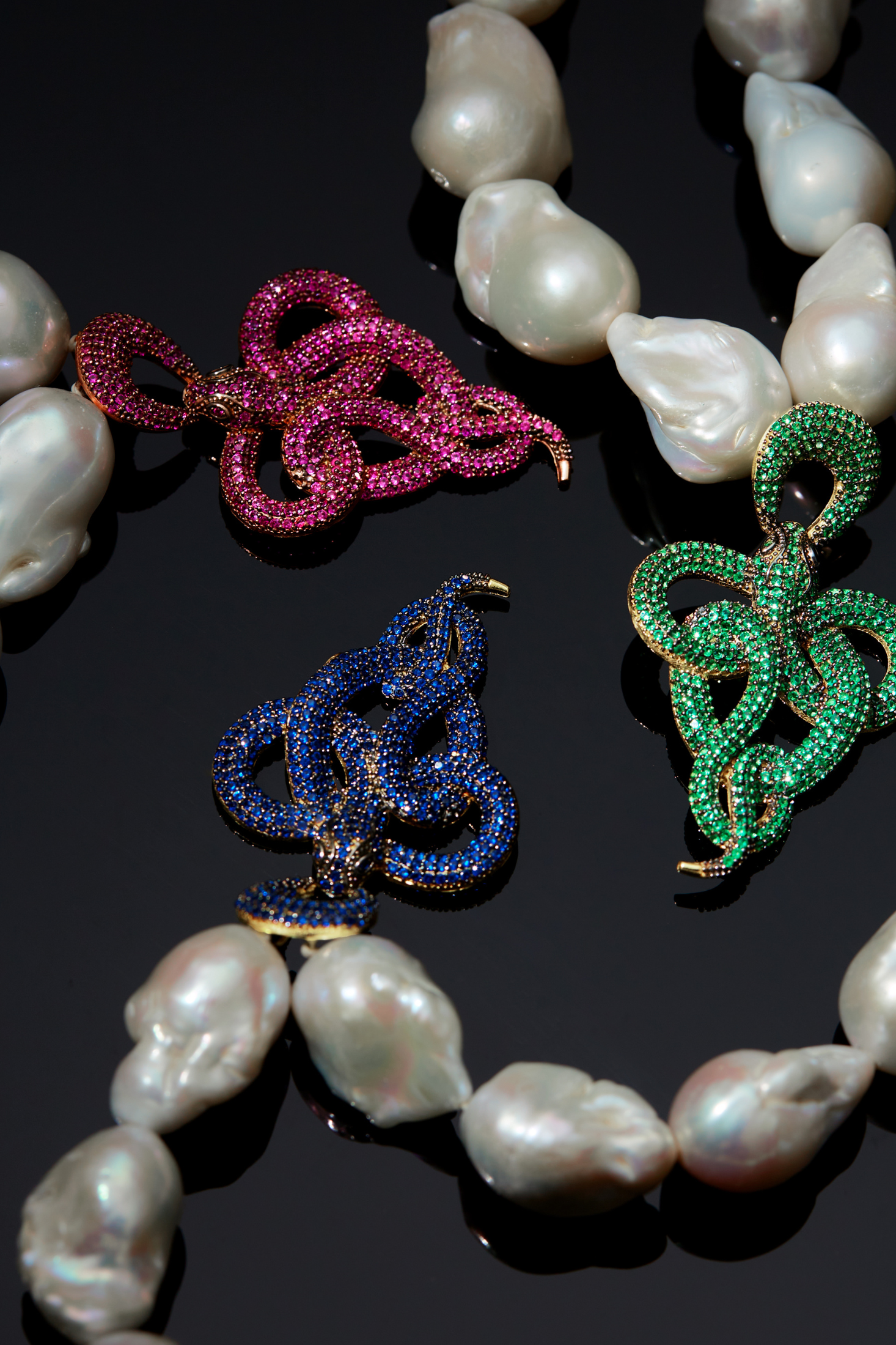 Viper Snake Baroque Pearl Statement Necklace Gold Sapphire CZ worn by a model, showing the pendant scale and how the chain sits.