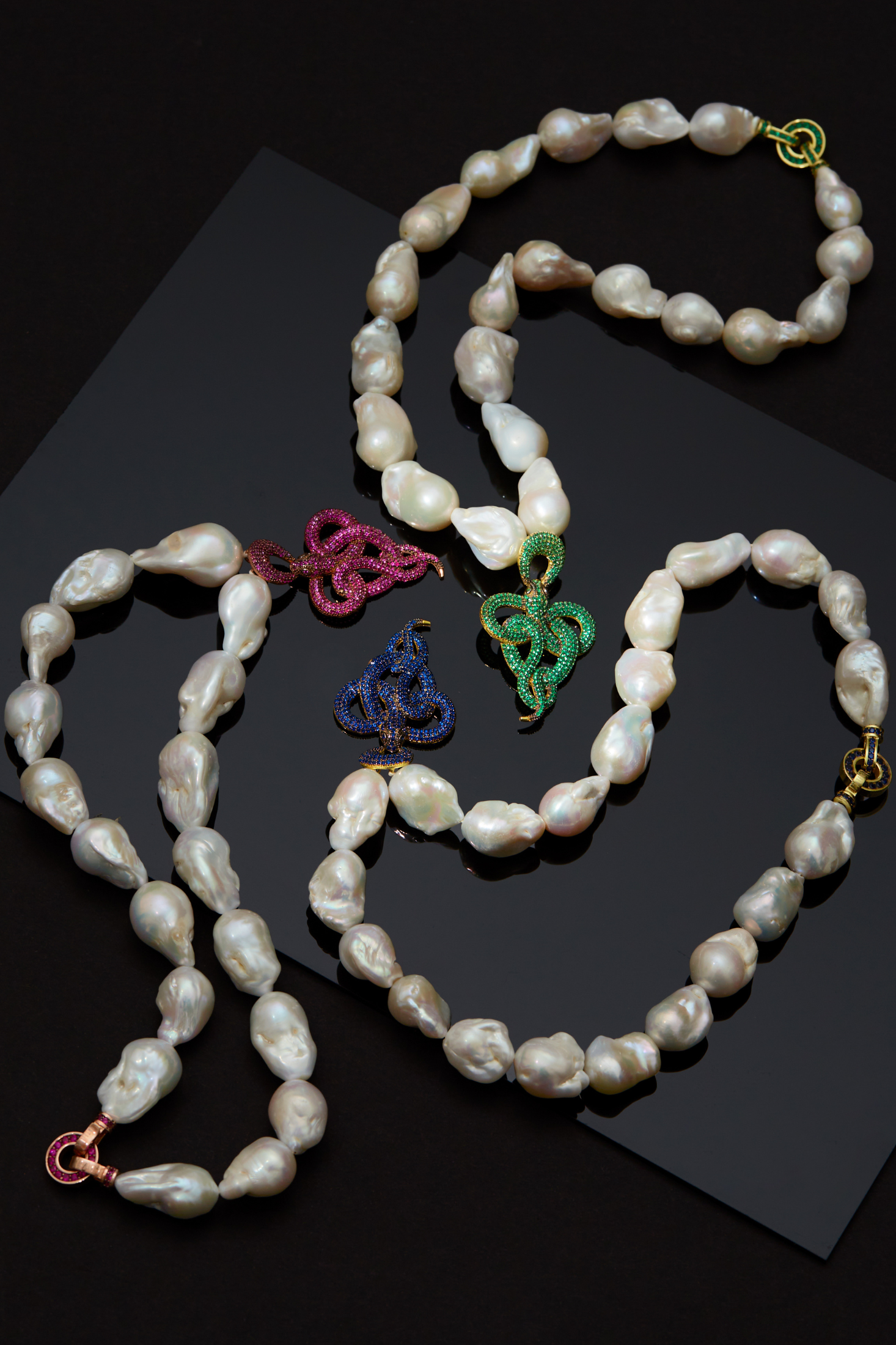 Viper Snake Baroque Pearl Statement Necklace Gold Sapphire CZ worn by a model, showing the pendant scale and how the chain sits.