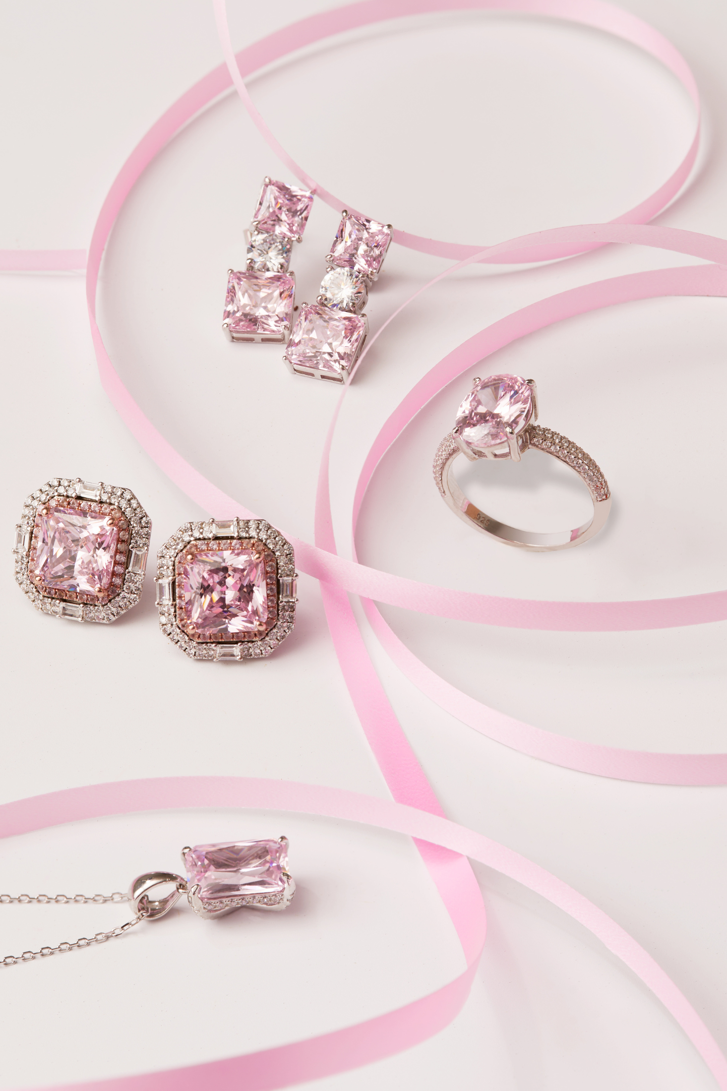 Penelope Drop Earrings Morganite Silver worn by a model, showing how they sit on the ear and their scale.