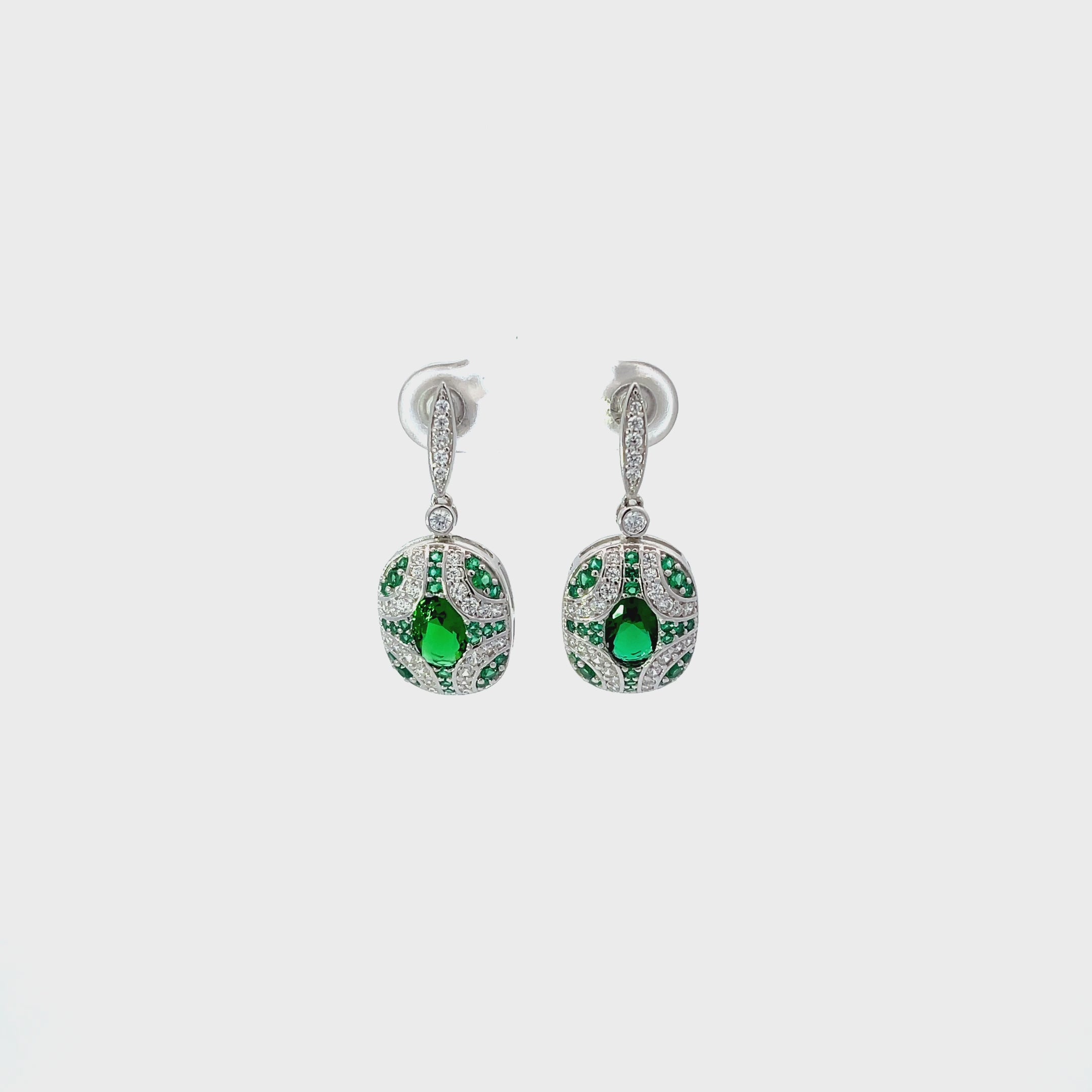 Video of Kensington Drop Earrings Emerald Silver, showing the drop, movement and scale from multiple angles.